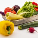 Varie verdure ad alto indice glicemico, evidenziando quelle da evitare per chi ha il diabete.